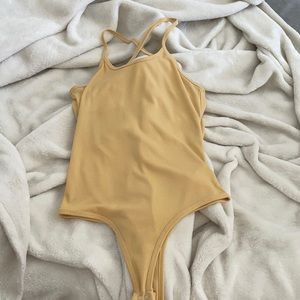 Yellow bodysuit